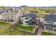 Aerial view of the backyard, patio, and home's exterior at 359 Rogers Way, Castle Rock, CO 80104