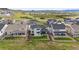 Expansive backyard featuring a well-manicured lawn, patio area with furniture, trampoline and privacy fence at 359 Rogers Way, Castle Rock, CO 80104