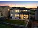 A spacious backyard features a patio, trampoline, and lush lawn, making it ideal for recreation and outdoor living at 359 Rogers Way, Castle Rock, CO 80104