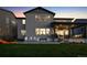 A covered patio with outdoor furniture complements this home's spacious backyard and enhances outdoor living at 359 Rogers Way, Castle Rock, CO 80104