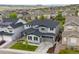 Charming two-story home with a well-maintained lawn, a covered porch, and an attached two-car garage at 359 Rogers Way, Castle Rock, CO 80104