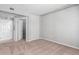 Bedroom with two entrances featuring carpet flooring and neutral-colored walls at 1521 Vine St # 108, Denver, CO 80206