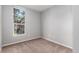 Bright bedroom with a large window providing natural light and outdoor views at 1521 Vine St # 108, Denver, CO 80206