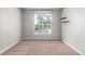 Bedroom featuring a bright window and carpet flooring at 1521 Vine St # 108, Denver, CO 80206