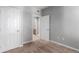 Bedroom featuring two doors, carpeting, and neutral walls at 1521 Vine St # 108, Denver, CO 80206