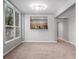 Bright dining space offers views of the kitchen through an open pass-through at 1521 Vine St # 108, Denver, CO 80206
