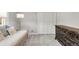 Comfortable bedroom featuring a trundle bed, dresser, and bright natural light at 5557 E Links Cir, Centennial, CO 80122