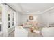 Bright living room with neutral tones, stylish furnishings, and large windows for natural light at 5557 E Links Cir, Centennial, CO 80122
