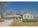 Charming one-story home features a well-maintained front yard and classic architectural details at 907 Stein St, Lafayette, CO 80026