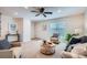 Bright living room with carpet, lots of natural light and large windows at 907 Stein St, Lafayette, CO 80026