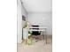 Bright, open bedroom with neutral walls, carpet, and a large window providing ample natural light, perfect as an office at 209 Wright St # 204, Lakewood, CO 80228