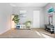 Versatile bedroom space with neutral tones, suitable for use as a home gym or fitness area, with workout equipment at 209 Wright St # 204, Lakewood, CO 80228