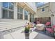 Outdoor patio with seating area and string lights at 7902 E 49Th Pl, Denver, CO 80238