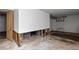 Unfinished basement with exposed utilities needing renovation at 2701 W Mississippi Ave, Denver, CO 80219