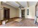 View of the interior room with hardwood floors and entryways at 2701 W Mississippi Ave, Denver, CO 80219