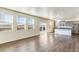 Modern kitchen with island and stainless steel appliances at 2262 Base St, Fort Lupton, CO 80621