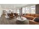 Open concept living room and kitchen with modern furniture at 2262 Base St, Fort Lupton, CO 80621