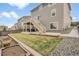 Large backyard with lawn and garden area at 18189 House Finch Ln, Parker, CO 80134