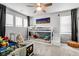 Bright ' bedroom with twin bunk beds and a ceiling fan at 18189 House Finch Ln, Parker, CO 80134