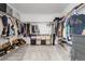 Walk-in closet with ample shelving and clothing racks at 18189 House Finch Ln, Parker, CO 80134
