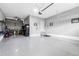Epoxy finished floor and ample storage space make this two car garage very versatile at 18189 House Finch Ln, Parker, CO 80134