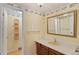 Bathroom with vanity and mirror at 930 S Dayton St, Denver, CO 80247