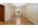 Formal dining room with chandelier and large window at 930 S Dayton St, Denver, CO 80247