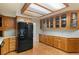 Spacious kitchen features oak cabinets at 930 S Dayton St, Denver, CO 80247