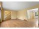 Open living room with hardwood floors and natural light at 930 S Dayton St, Denver, CO 80247