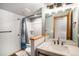 Basement bathroom with shower and vanity at 580 Mount Massive St, Berthoud, CO 80513