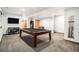 Finished basement rec room with pool table at 580 Mount Massive St, Berthoud, CO 80513