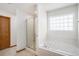 Relaxing bathroom with a soaking tub and walk-in shower at 580 Mount Massive St, Berthoud, CO 80513