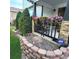 Brick front porch with colorful flower boxes and landscaping at 580 Mount Massive St, Berthoud, CO 80513