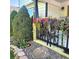 Charming front porch adorned with colorful flower boxes at 580 Mount Massive St, Berthoud, CO 80513