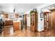 Kitchen with wood cabinets, stainless steel appliances, and an island at 580 Mount Massive St, Berthoud, CO 80513