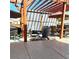 Covered patio features a pergola, comfortable seating, and a grill at 580 Mount Massive St, Berthoud, CO 80513