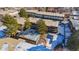 Aerial view showing apartment building and pool at 4653 S Lowell Blvd # B, Denver, CO 80236