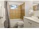 Bathroom with tub, shower, and updated vanity at 4653 S Lowell Blvd # B, Denver, CO 80236