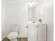 Clean bathroom with white vanity and toilet at 4653 S Lowell Blvd # B, Denver, CO 80236