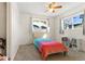 Cozy bedroom with twin bed and ample closet space at 4653 S Lowell Blvd # B, Denver, CO 80236