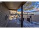 Private patio with grill and seating area, perfect for outdoor entertaining at 4653 S Lowell Blvd # B, Denver, CO 80236