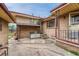 Brick exterior with a private backyard patio and walkway at 3854 Perry St, Denver, CO 80212
