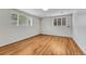 Bedroom with hardwood floors and neutral white wall paint at 3854 Perry St, Denver, CO 80212