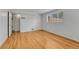 Bedroom with hardwood floors, white walls, and a closet at 3854 Perry St, Denver, CO 80212