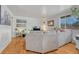 Spacious living room area with hardwood floors and plenty of natural light at 3854 Perry St, Denver, CO 80212