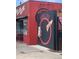 A restaurant called Hops & Pie is painted on the outside with a picture of pizza at 3854 Perry St, Denver, CO 80212