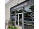Huckleberry Roasters storefront with large windows showcases interior cafe seating and colorful lettering at 3854 Perry St, Denver, CO 80212