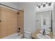 Full bathroom featuring a shower-tub, a neutral vanity, and a framed mirror at 1822 Painter Dr, Monument, CO 80132