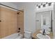 Cozy bathroom with tiled shower and double sinks with plenty of light at 1822 Painter Dr, Monument, CO 80132