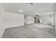 Spacious bonus room with neutral carpet, ceiling fan, and ample natural light at 1822 Painter Dr, Monument, CO 80132